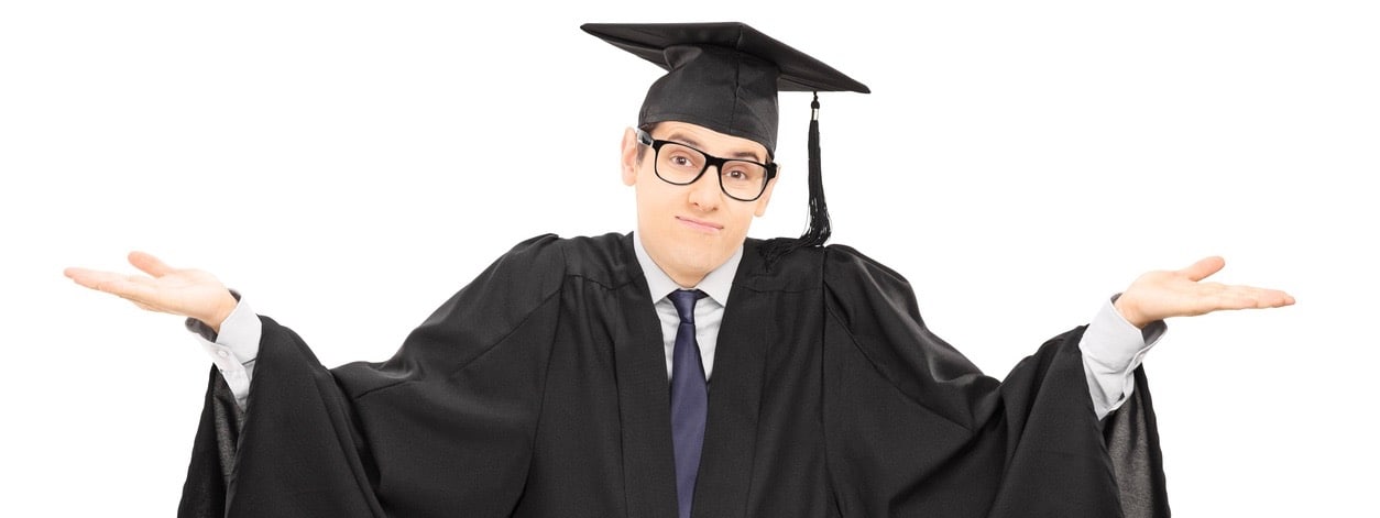 Uncertain student in graduation gown gesturing with hands isolated on white background