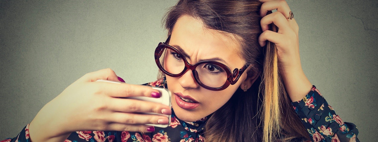 unhappy upset young woman surprised she is losing hair