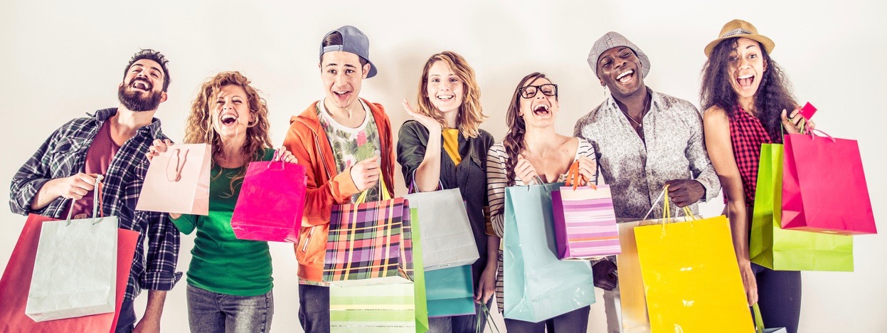 Generation Z group holding shopping bags