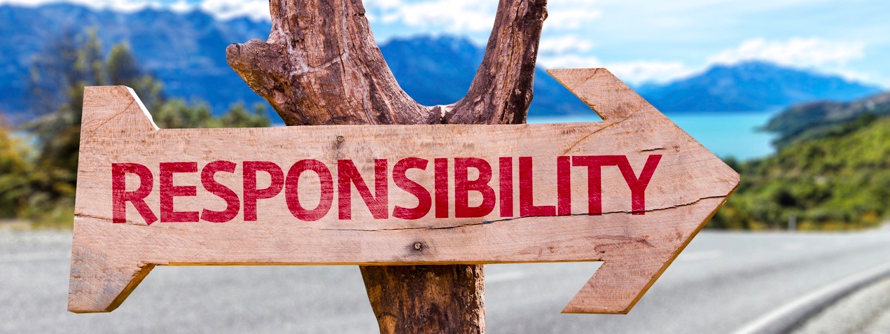 Responsibility wooden sign with a street background