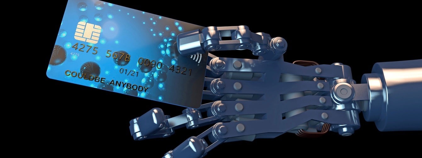Robot hand holding a generic credit card