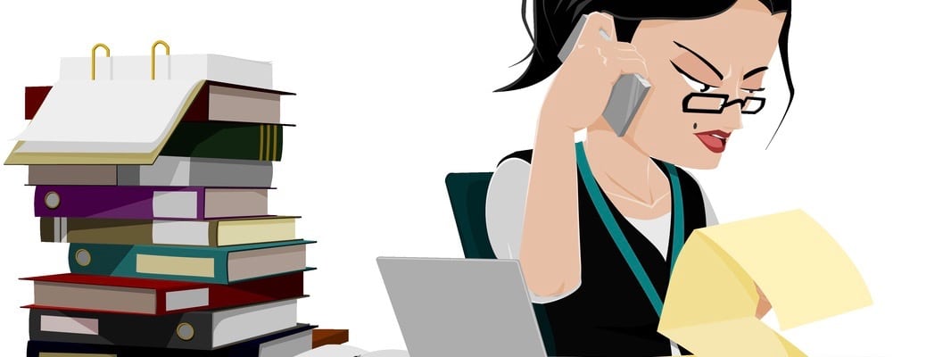 Busy purchaser are calling with the supplier at her desk
