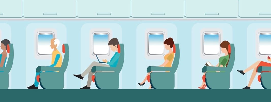 Airline interior with plane seat and airplane passengers