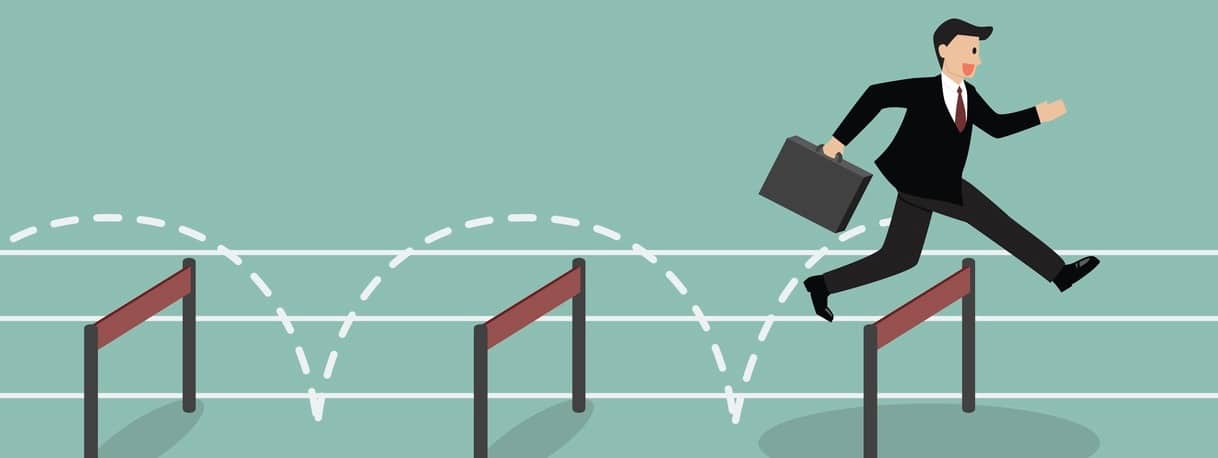 Businessman jumping over hurdle. Business concept