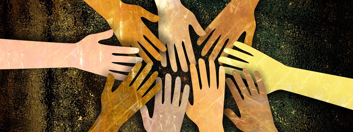 A grunge textured digital illustration of a group of diverse hands reaching together in unity and support.