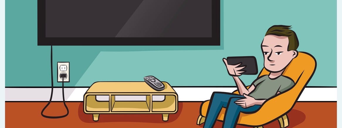 A man watches tv on his phone instead of his wide-screen television