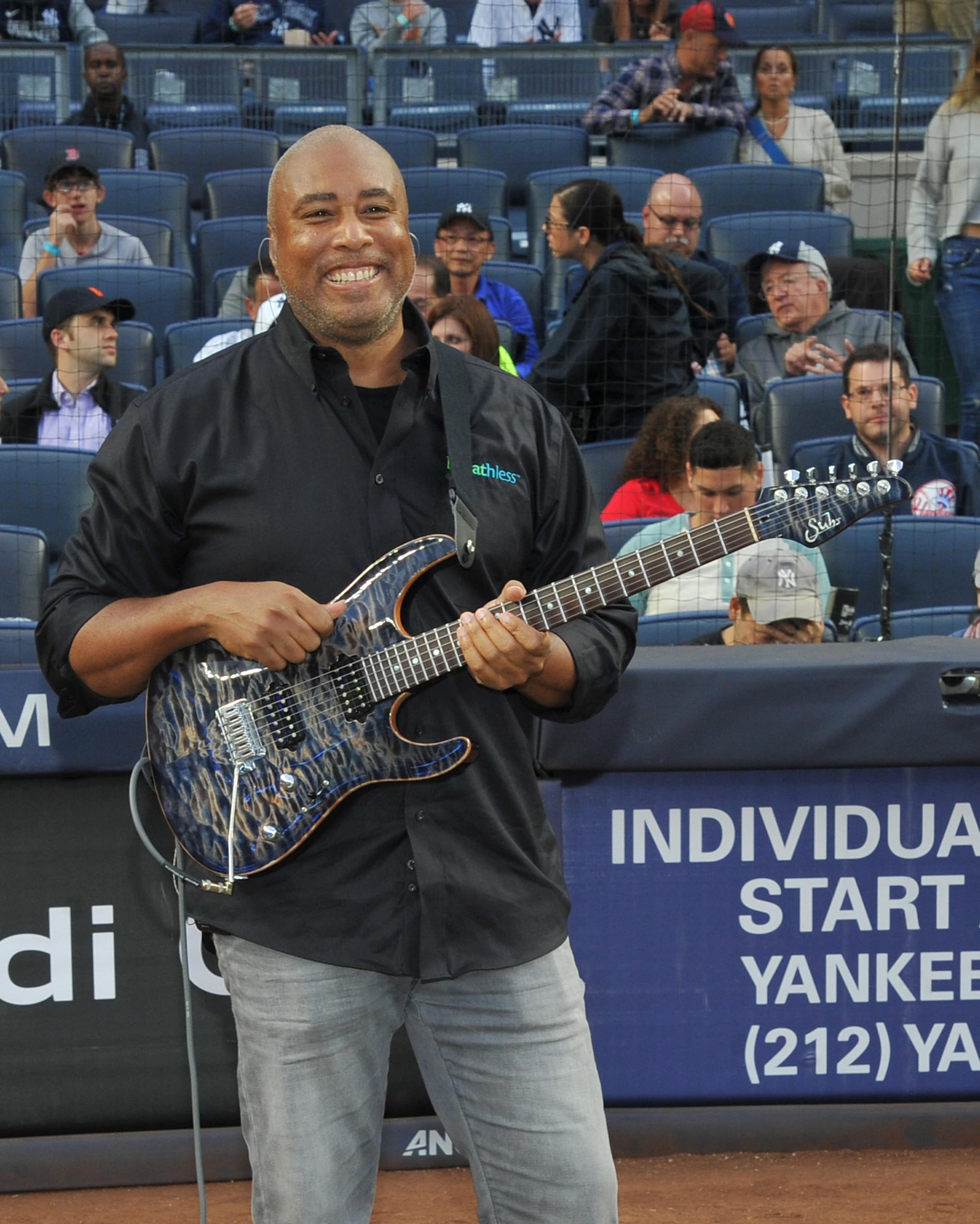 Legendary Yankee and Latin Grammy-nominated musician Bernie Williams performing the national anthem at Yankee Stadium during Pulmonary Fibrosis Awareness Month in honor of his father who passed away from the rare lung disease idiopathic pulmonary fibrosis (IPF). Learn more at www.BreathlessIPF.com. #BreathlessIPF