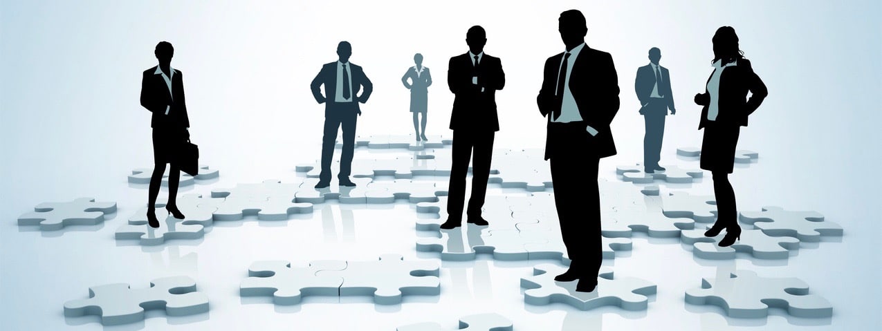 Business silhouettes standing on a puzzle pieces. Concept illustration