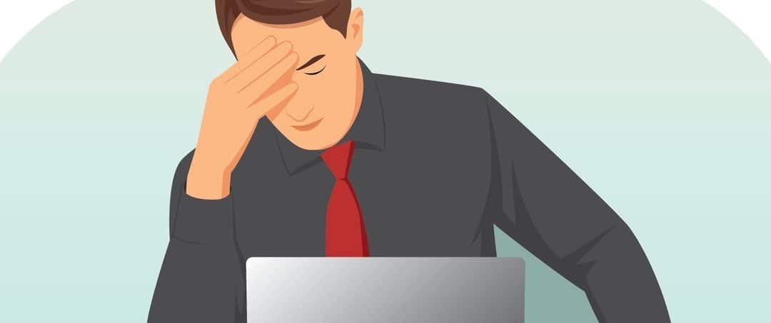 Overworked businessman is under stress with headache