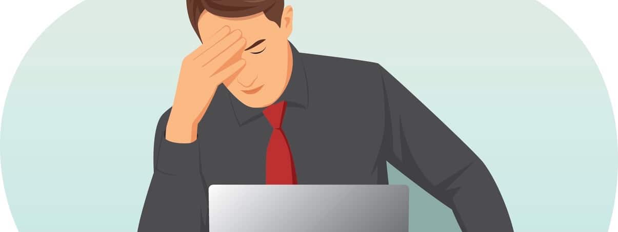 Overworked businessman is under stress with headache