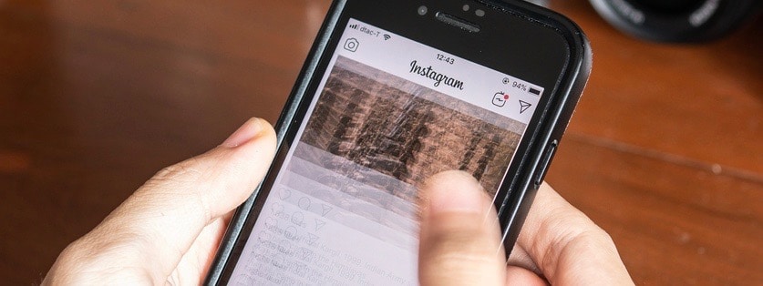 Instagram user swiping through the Instagram's feed
