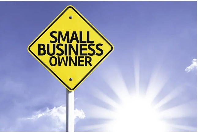 Street sign that reads Small Business Owner