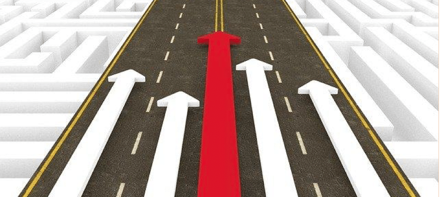 An image of highway showing multiple arrows moving forward, with a red arrow leading in front, symbolizing a good office manager.