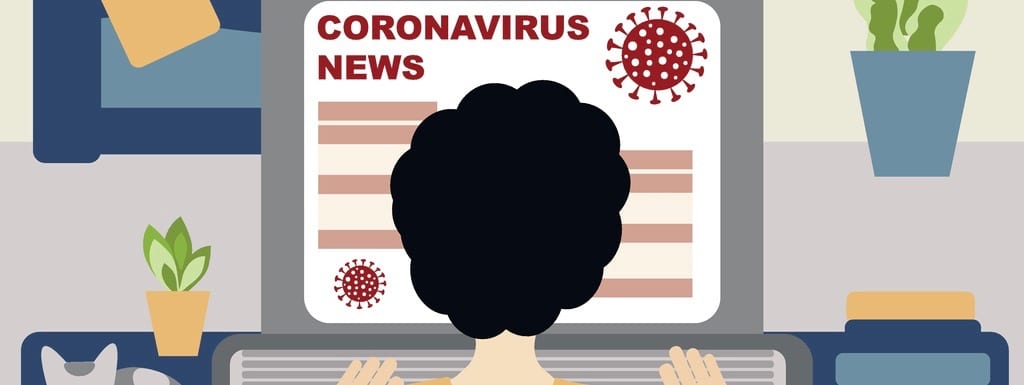Coronavirus concept news. A man is sitting at his laptop reading the Coronavirus news. Virus concept 2019-nCoV, covid-19