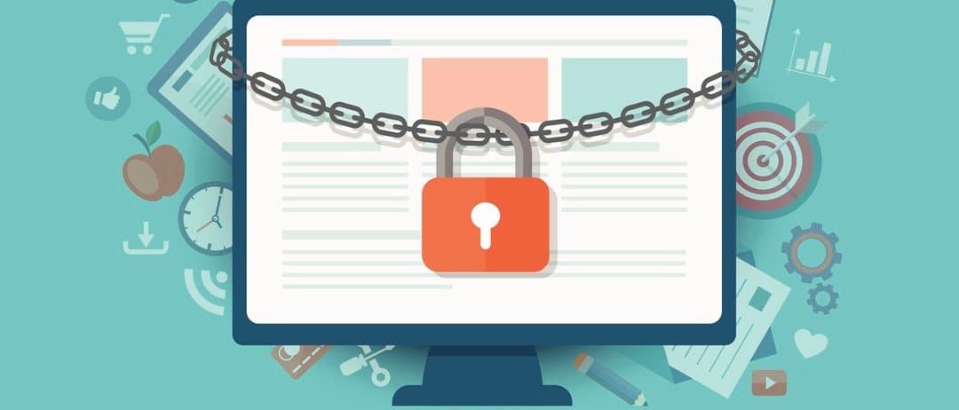 Lock with chain around laptop.