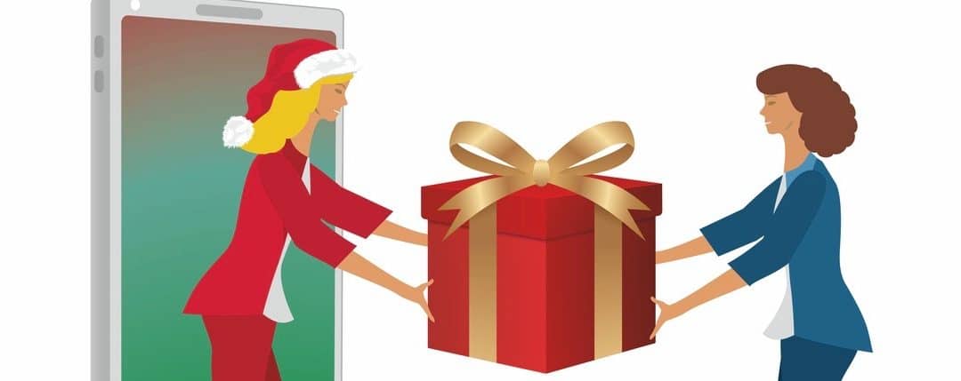 Santa Claus, smart phone and gift box.