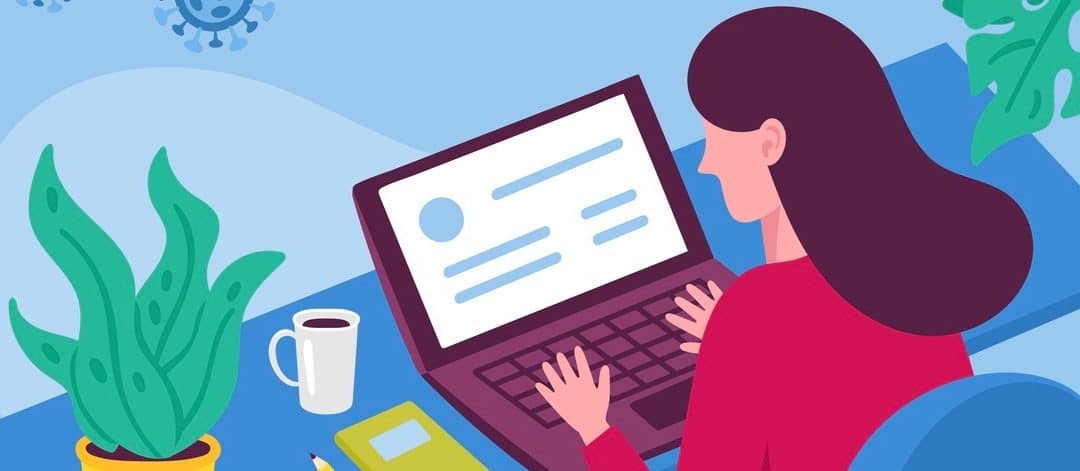 Woman working on laptop.