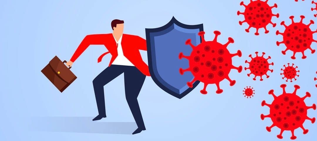 Businessman holding shield against new coronavirus