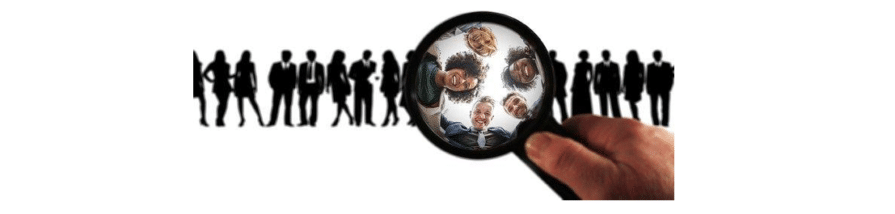 Silhouettes of people in a line and a magnifying glass zooming in on a few of them, a symbolic representation of PR challenges CRM software can solve.