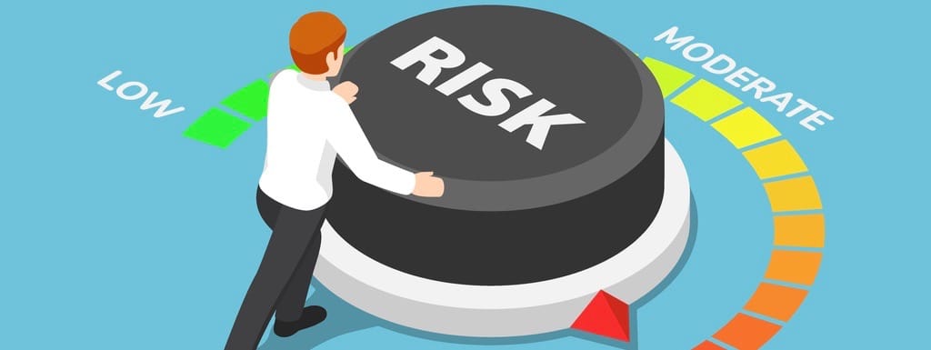 businessman turning risk button to high position.