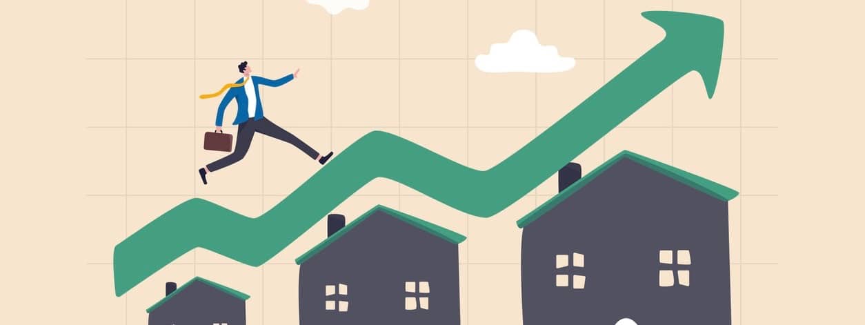 businessman running on rising green graph on house roof.