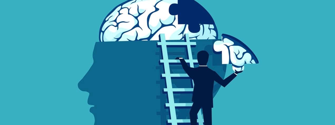 Business man climbing up the stairs reaching human head to add piece of brain puzzle.