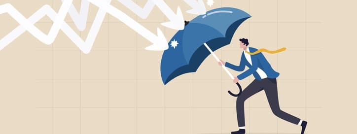 businessman holding umbrella to cover and protect from downturn arrow.
