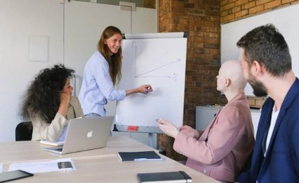 Person explaining how proactive PR measures can prevent reputation disasters to their team.