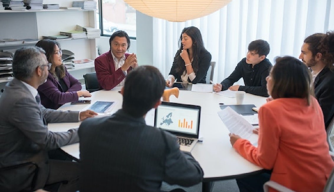 Group of people having a meeting in an office.