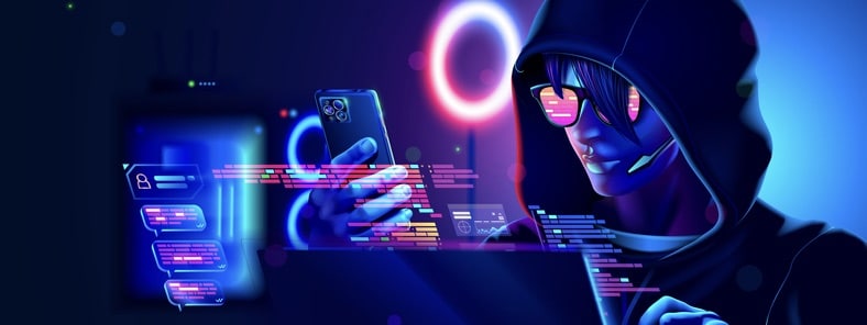 Hacker or phone scammer in hood hacking at computer and mobile smartphone in dark room.