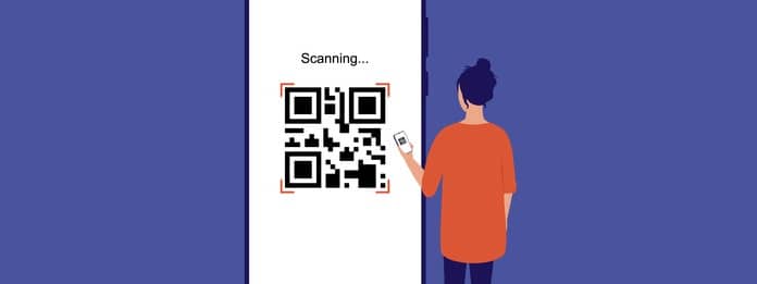 Young Woman Using Mobile Phone To Scan A QR Code. Isolated On Color Background.