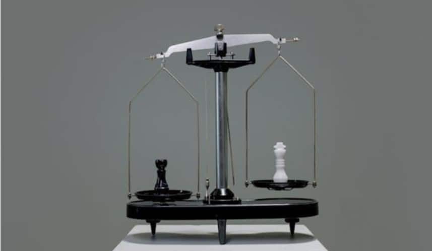 Chess piece on a scale :