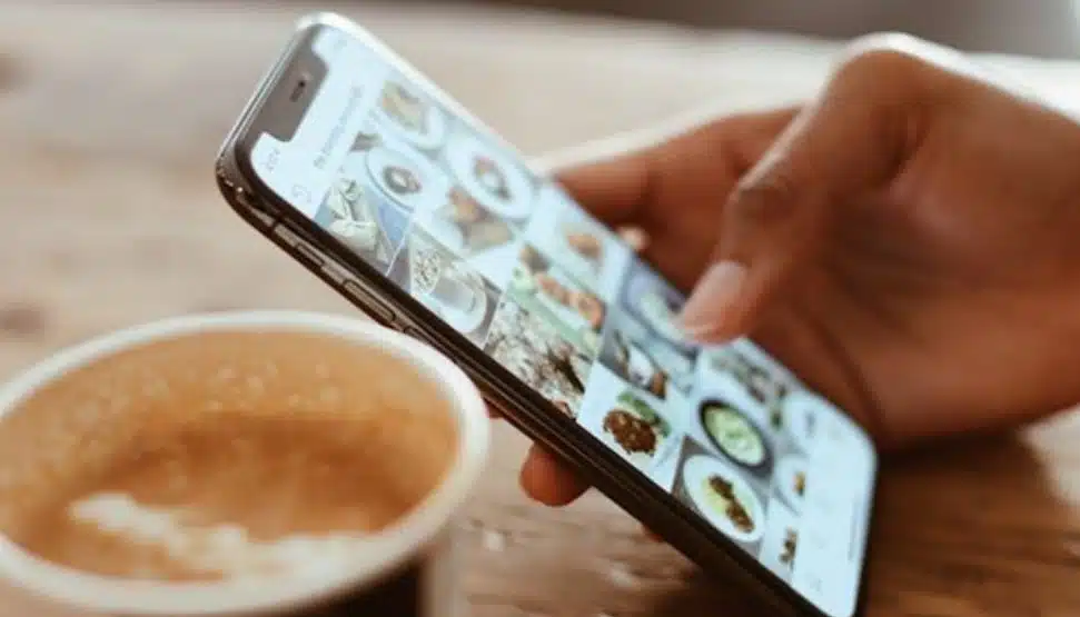 A person scrolling through their phone